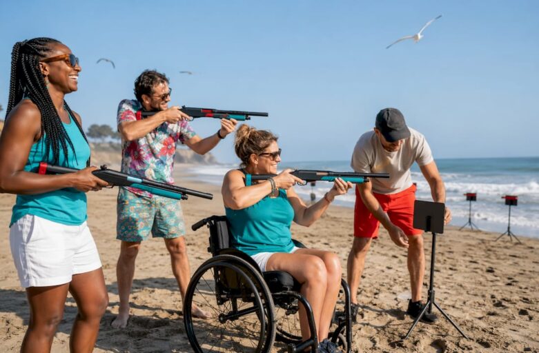 Group enjoying adaptive outdoor laser clay shooting