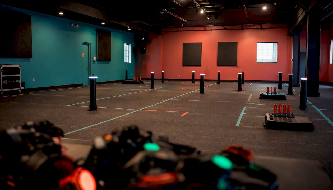 Indoor venue setup for laser clay shooting session