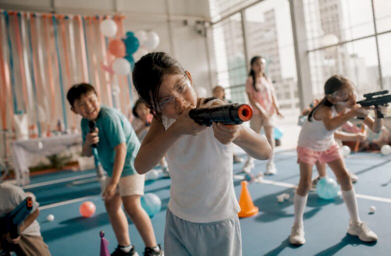Children playing at indoor birthday party