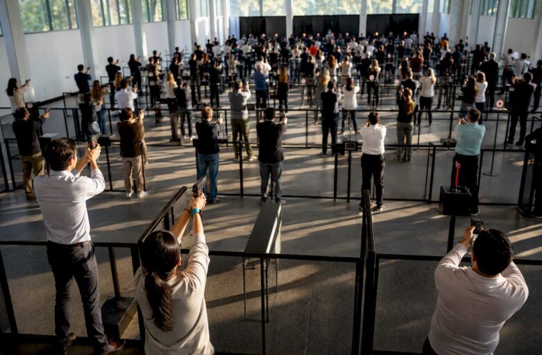 Large group playing laser shooting indoors
